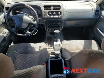 Zdjęcie 8 z 12 samochodu: 2001 NISS FRONTIER VIN:1N6ED27T91C393645 - miniatura