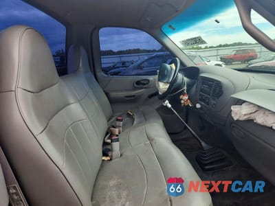 Zdjęcie 10 z 12 samochodu: 1999 FORD F150 VIN:1FTZF1727XNB93277 - miniatura