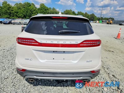 Zdjęcie 6 z 13 samochodu: 2018 LINCOLN MKC PREMIERE VIN:5LMCJ1C95JUL14837 - miniatura