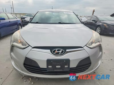 Piąte zdjęcie samochodu w środku: 2014 HYUNDAI VELOSTER BASE VIN:KMHTC6AD3EU188582 - miniatura
