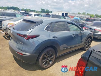 Trzecie zdjęcie samochodu z tyłu: 2023 MAZDA CX-30 PREFERRED VIN:3MVDMBCM0PM545217 - miniatura