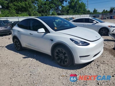 Czwarte zdjęcie samochodu z boku: 2023 TESLA MODEL Y VIN:7SAYGDEEXPA056548 - miniatura