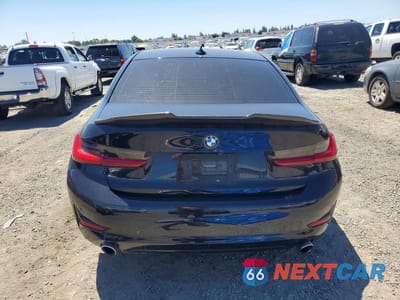 Zdjęcie 6 z 12 samochodu: 2021 BMW 330I VIN:3MW5R1J06M8B91092 - miniatura