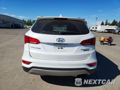 Zdjęcie 6 z 12 samochodu: 2017 HYUNDAI SANTA FE SPORT 2.0T ULTIMATE VIN:5XYZWDLAXHG460774 - miniatura