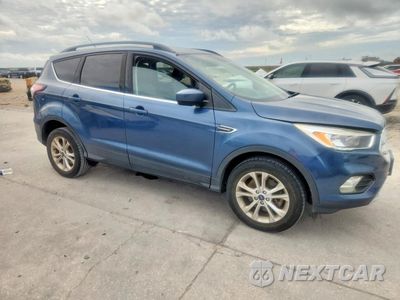 Czwarte zdjęcie samochodu z boku: 2018 FORD ESCAPE SE VIN:1FMCU9GD0JUC84248 - miniatura