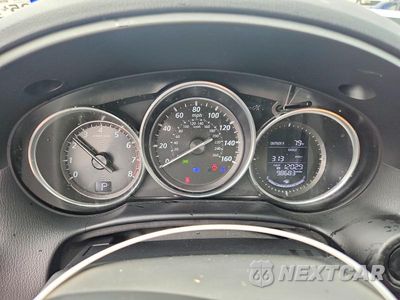 Zdjęcie 9 z 13 samochodu: 2014 MAZDA CX-5 TOURING VIN:JM3KE2CY4E0310996 - miniatura