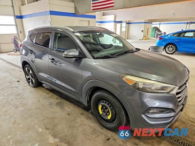 Czwarte zdjęcie samochodu z boku: 2016 HYUNDAI TUCSON SPORT VIN:KM8J33A22GU183395 - miniatura