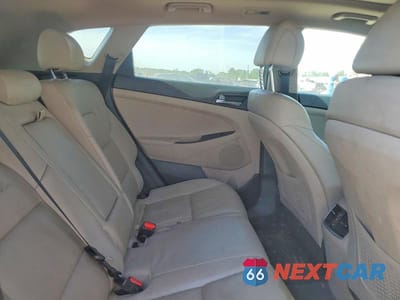 Zdjęcie 11 z 13 samochodu: 2016 HYUNDAI TUCSON LIMITED VIN:KM8J33A26GU077385 - miniatura
