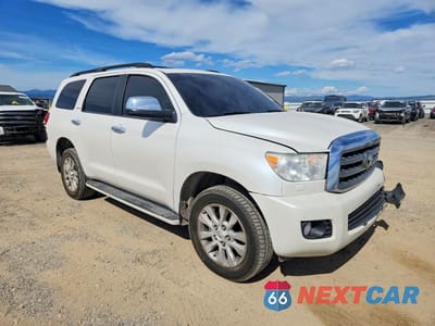 Czwarte zdjęcie samochodu z boku: 2016 TOYOTA SEQUOIA PLATINUM VIN:5TDDY5G15GS127856 - miniatura