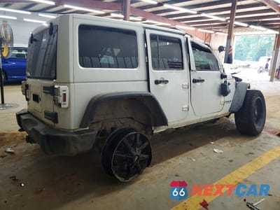 Trzecie zdjęcie samochodu z tyłu: 2012 JEEP WRANGLER UNLIMITED SAHARA VIN:1C4BJWEG9CL167474 - miniatura