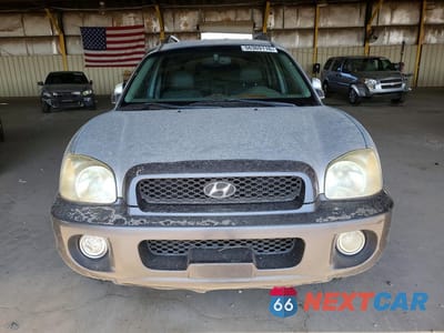 Piąte zdjęcie samochodu w środku: 2003 HYUNDAI SANTA FE GLS VIN:KM8SC13D63U433531 - miniatura