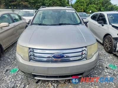 Piąte zdjęcie samochodu w środku: 2008 FORD TAURUS X SEL VIN:1FMDK02WX8GA35642 - miniatura