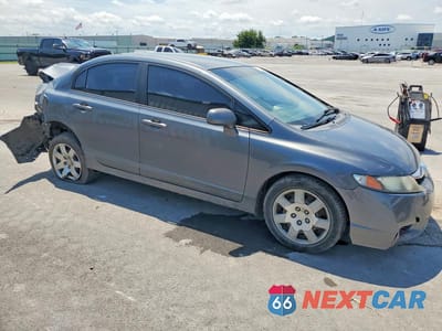 Czwarte zdjęcie samochodu z boku: 2009 HONDA CIVIC LX VIN:1HGFA16559L015350 - miniatura