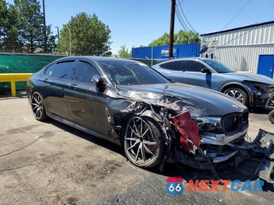 Czwarte zdjęcie samochodu z boku: 2016 BMW 750 XI VIN:WBA7F2C53GG418339 - miniatura