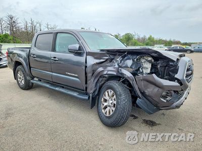 Czwarte zdjęcie samochodu z boku: 2019 TOYOTA TACOMA SR5 V6 VIN:3TMCZ5AN4KM210675 - miniatura