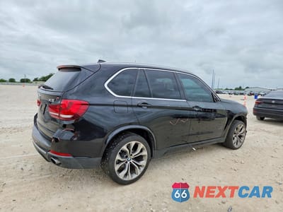 Trzecie zdjęcie samochodu z tyłu: 2014 BMW X5 VIN:5UXKR0C50E0K49586 - miniatura