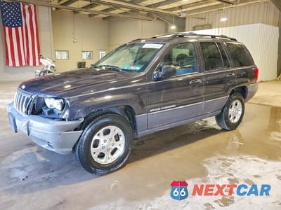 1999 JEEP GRAND CHEROKEE LAREDO 1J4GW58S7XC553733 - główne zdjęcie licytacji z USA - miniatura