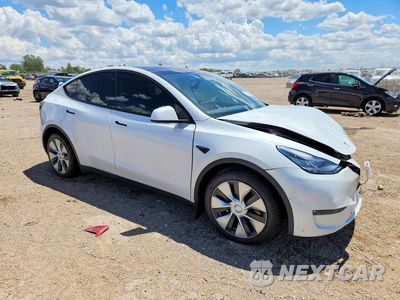 Czwarte zdjęcie samochodu z boku: 2022 TESLA MODEL Y VIN:7SAYGAEE2NF313510 - miniatura
