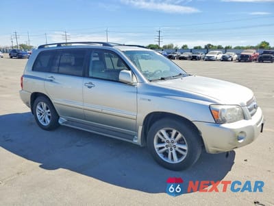 Czwarte zdjęcie samochodu z boku: 2006 TOYOTA HIGHLANDER HYBRID VIN:JTEEW21A760009340 - miniatura