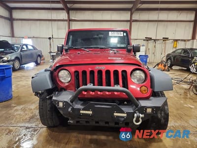 Piąte zdjęcie samochodu w środku: 2013 JEEP WRANGLER UNLIMITED SPORT VIN:1C4BJWDGXDL609780 - miniatura