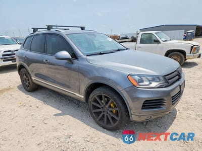 Czwarte zdjęcie samochodu z boku: 2011 VOLKSWAGEN TOUAREG V6 VIN:WVGFF9BP3BD001237 - miniatura