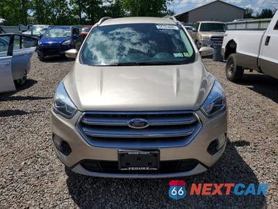 Piąte zdjęcie samochodu w środku: 2017 FORD ESCAPE TITANIUM VIN:1FMCU9JD1HUC21081 - miniatura