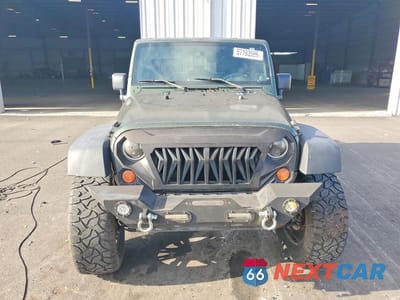 Piąte zdjęcie samochodu w środku: 2007 JEEP WRANGLER SAHARA VIN:1J4GB59117L143088 - miniatura