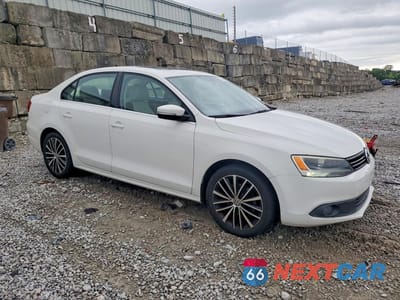 Czwarte zdjęcie samochodu z boku: 2012 VOLKSWAGEN JETTA SEL VIN:3VWLX7AJ8CM376646 - miniatura