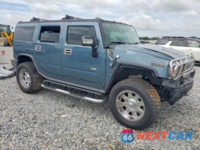 Czwarte zdjęcie samochodu z boku: 2006 HUMMER H2 VIN:5GRGN23U16H102460 - miniatura