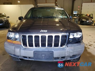 Piąte zdjęcie samochodu w środku: 1999 JEEP GRAND CHEROKEE LAREDO VIN:1J4GW58S7XC553733 - miniatura