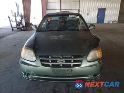 Piąte zdjęcie samochodu w środku: 2005 HYUNDAI ACCENT GL VIN:KMHCG45C85U605365 - miniatura