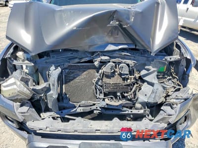 Zdjęcie 11 z 12 samochodu: 2018 TOYOTA TACOMA SR5 V6 VIN:3TMAZ5CN8JM053574 - miniatura