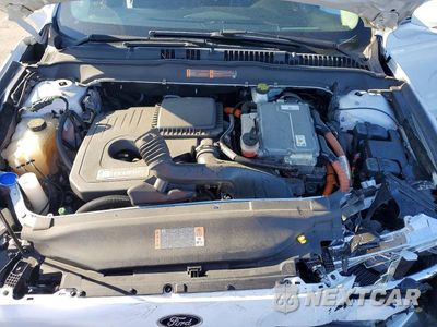 Zdjęcie 11 z 12 samochodu: 2018 FORD FUSION SE HYBRID VIN:3FA6P0LU6JR172111 - miniatura