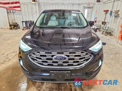 Piąte zdjęcie samochodu w środku: 2019 FORD EDGE TITANIUM VIN:2FMPK4K95KBB57354 - miniatura