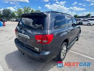 Czwarte zdjęcie samochodu z boku: 2012 TOYOTA SEQUOIA PLATINUM VIN:5TDDW5G11CS071124 - miniatura