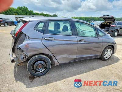 Trzecie zdjęcie samochodu z tyłu: 2020 HONDA FIT LX VIN:3HGGK5H47LM727894 - miniatura