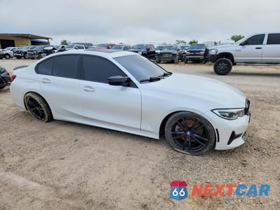 Czwarte zdjęcie samochodu z boku: 2019 BMW 330XI VIN:WBA5R7C54KAJ85465 - miniatura
