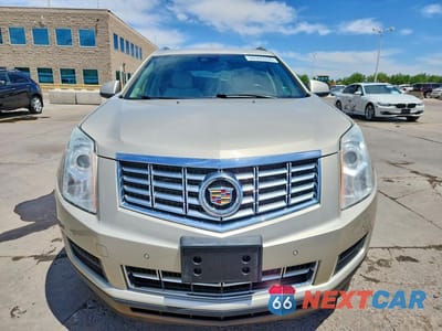 Piąte zdjęcie samochodu w środku: 2016 CADILLAC SRX LUXURY COLLECTION VIN:3GYFNBE32GS566278 - miniatura