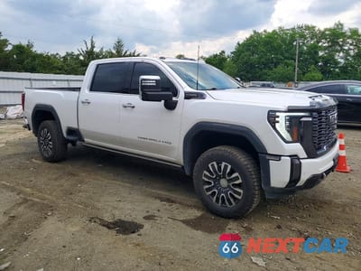 Czwarte zdjęcie samochodu z boku: 2024 GMC SIERRA K3500 DENALI ULTIMATE VIN:1GT49YEY0RF157073 - miniatura
