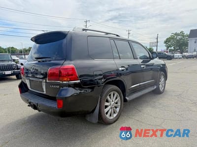 Czwarte zdjęcie samochodu z boku: 2011 LEXUS LX 570 VIN:JTJHY7AX5B4082039 - miniatura