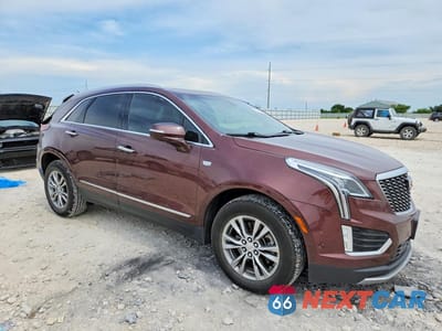 Czwarte zdjęcie samochodu z boku: 2023 CADILLAC XT5 PREMIUM LUXURY VIN:1GYKNCRS6PZ108641 - miniatura