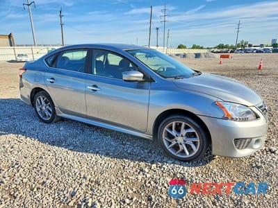 Czwarte zdjęcie samochodu z boku: 2014 NISSAN SENTRA SR VIN:3N1AB7AP9EY279600 - miniatura