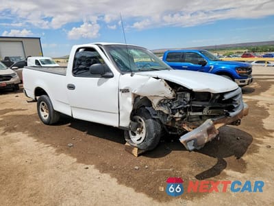 Czwarte zdjęcie samochodu z boku: 2001 FORD F150 VIN:1FTZF172X1NB05037 - miniatura