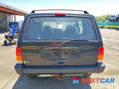 Zdjęcie 6 z 13 samochodu: 2001 JEEP CHEROKEE SPORT VIN:1J4FF48S01L608732 - miniatura