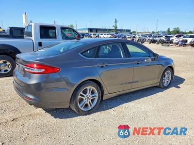 Trzecie zdjęcie samochodu z tyłu: 2018 FORD FUSION SE VIN:3FA6P0H79JR140658 - miniatura