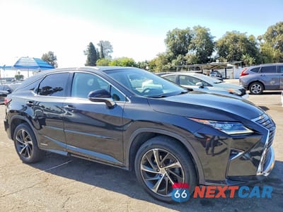 Czwarte zdjęcie samochodu z boku: 2017 LEXUS RX 450H BASE VIN:2T2BGMCA9HC011706 - miniatura