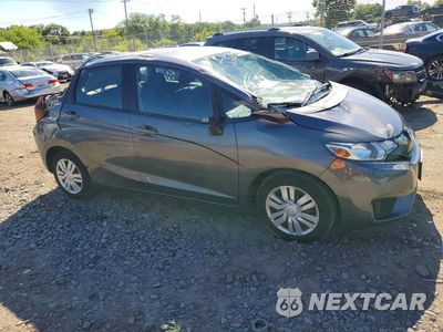 Czwarte zdjęcie samochodu z boku: 2017 HONDA FIT LX VIN:3HGGK5H50HM706014 - miniatura