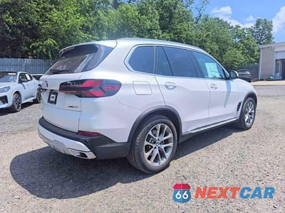 Czwarte zdjęcie samochodu z boku: 2026 BMW X5 XDRIVE40I VIN:5UX23EU09T9238757 - miniatura