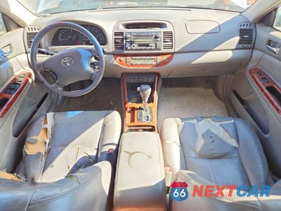 Zdjęcie 8 z 12 samochodu: 2003 TOYOTA CAMRY XLE V6 VIN:JTDBF30K630142223 - miniatura