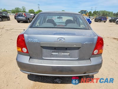 Zdjęcie 6 z 13 samochodu: 2004 HYUNDAI ACCENT GL VIN:KMHCG45C04U572411 - miniatura